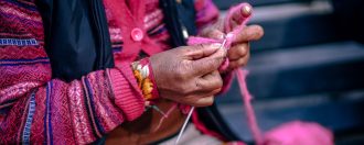 Elderly person knitting