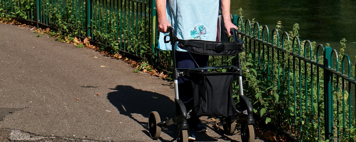 elderly person with walking frame