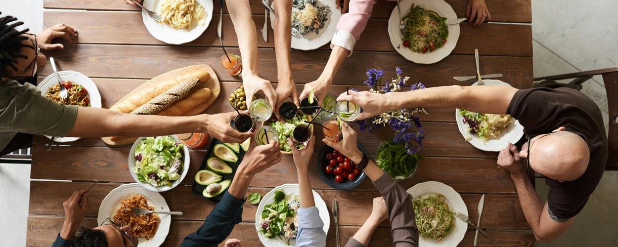 people having a meal to foster community